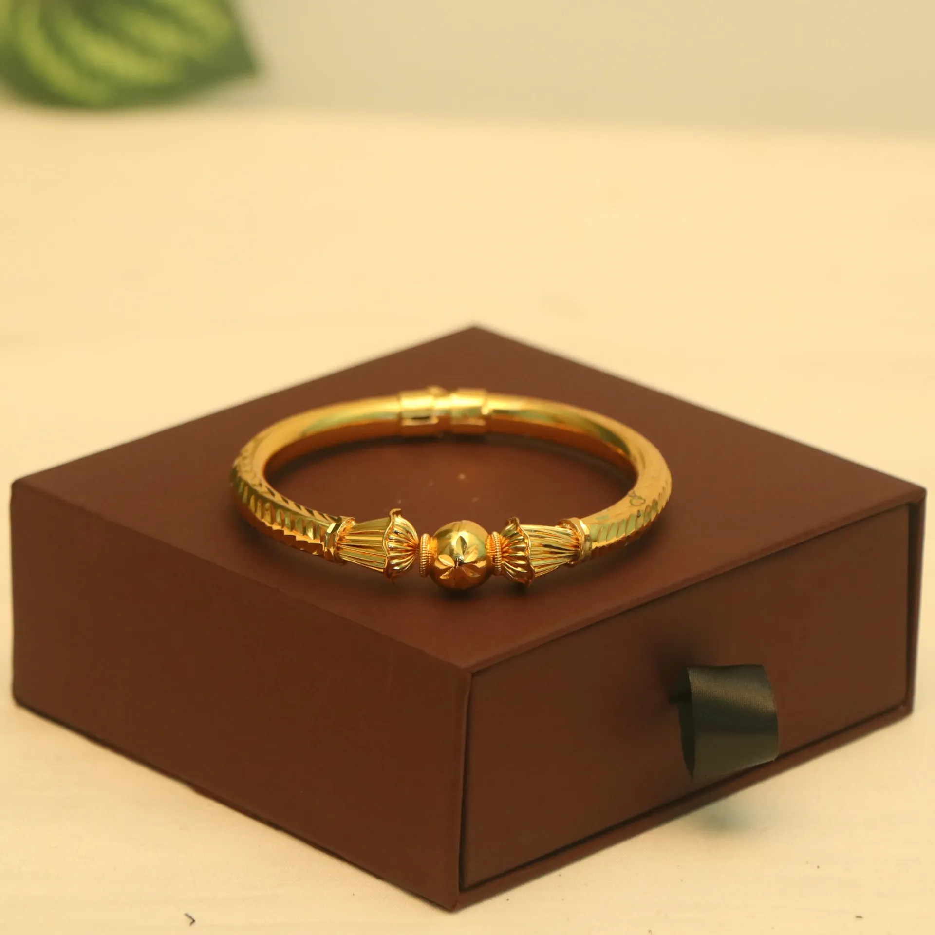SS Sahana Globe-Center Gold-Plated Bracelets