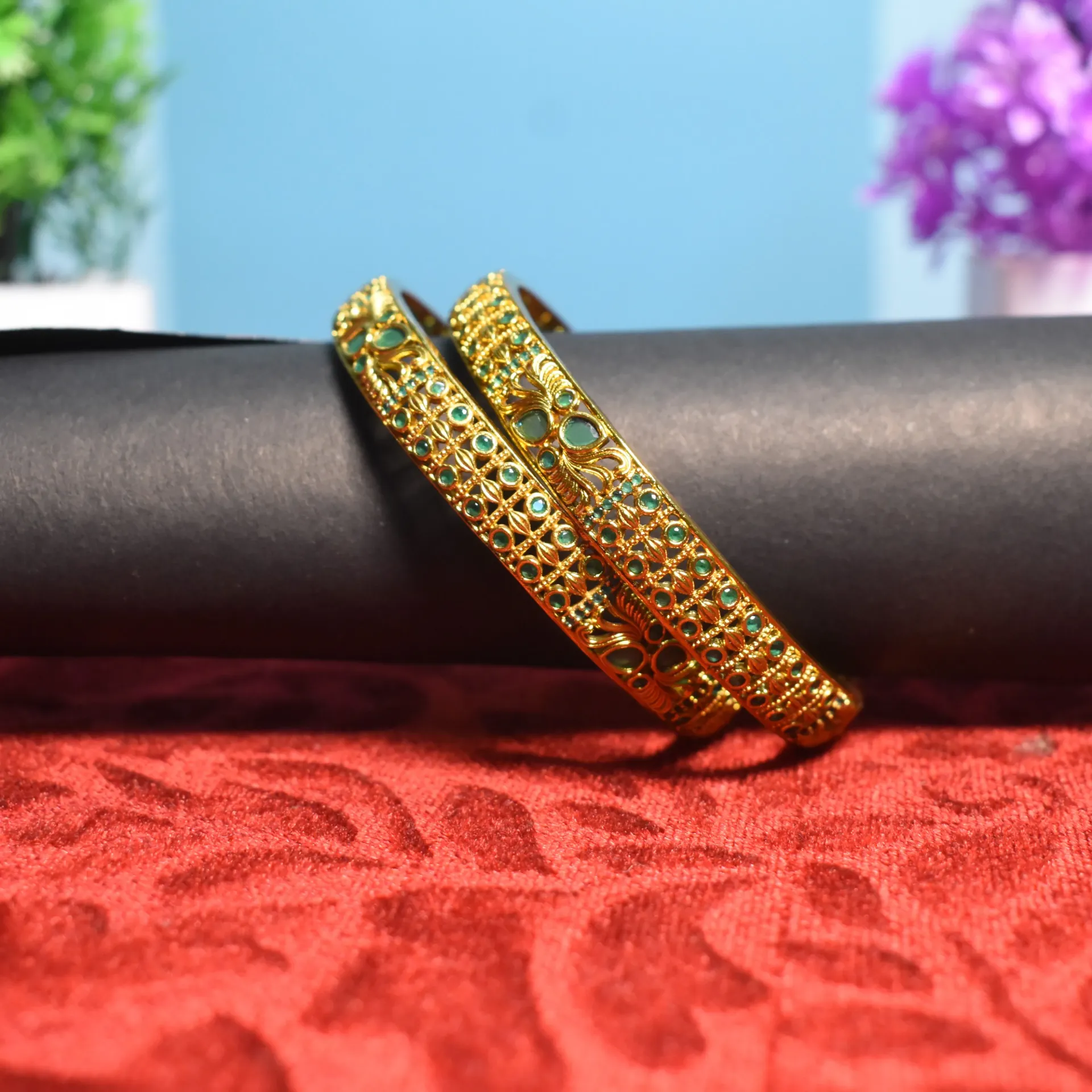 Intricate Lattice-Work Gold-Finished Bangles with Green Gems