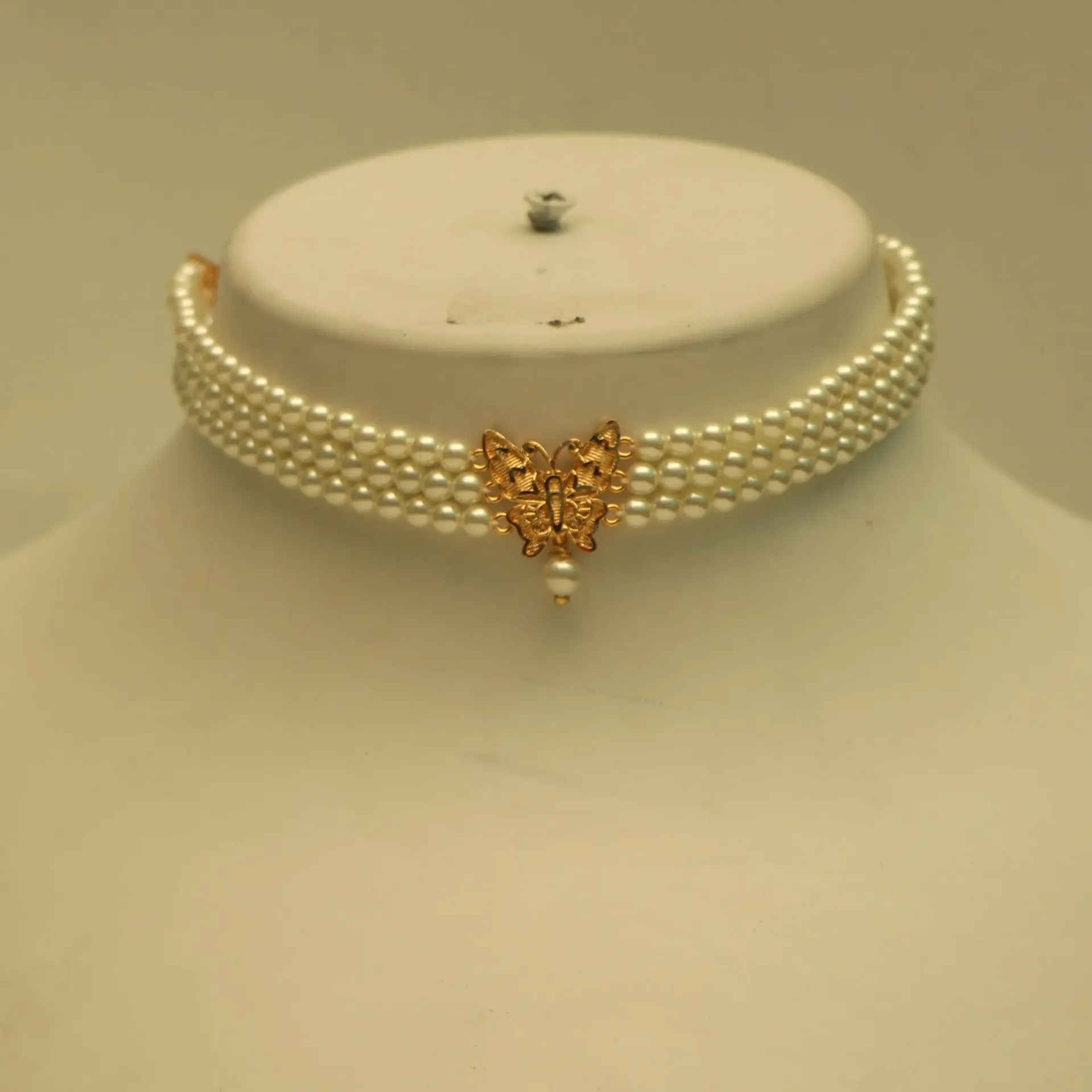 [NECKLACES-00459] Shreehari Golden Titli Three-Layer Pearl Choker