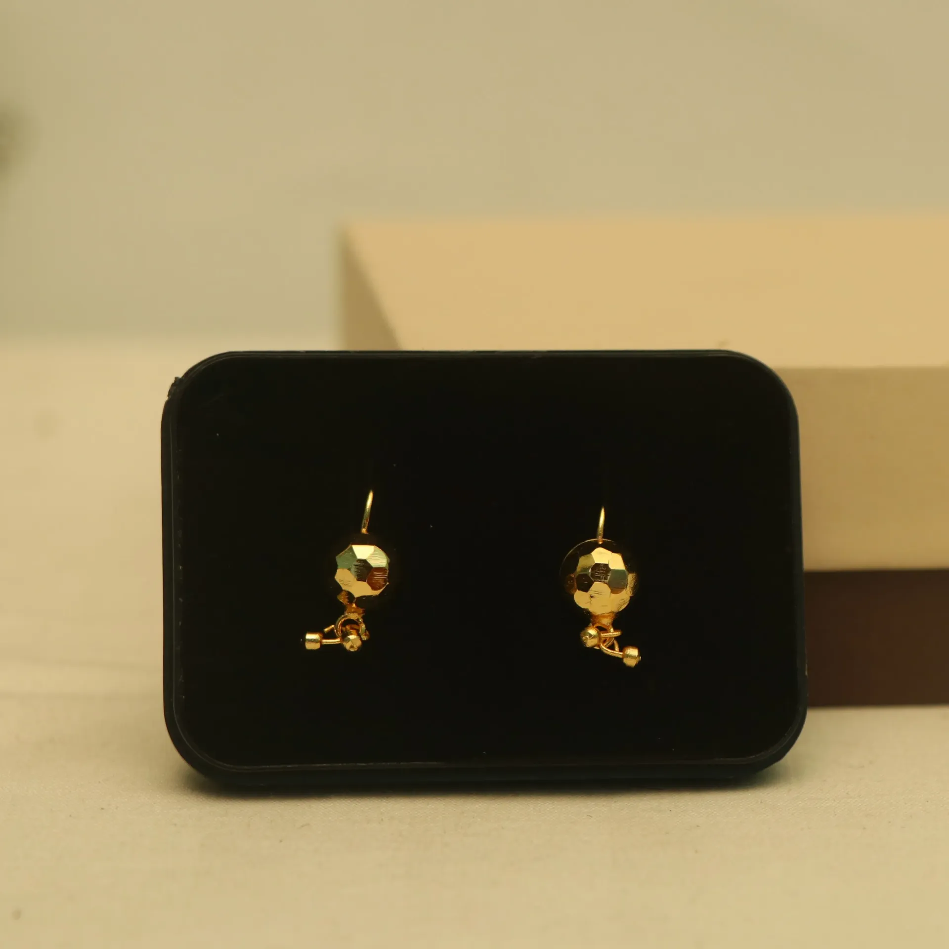 Arihant Gleaming Faceted Globe Drop Earrings